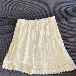 White flowy skirt, knee-length